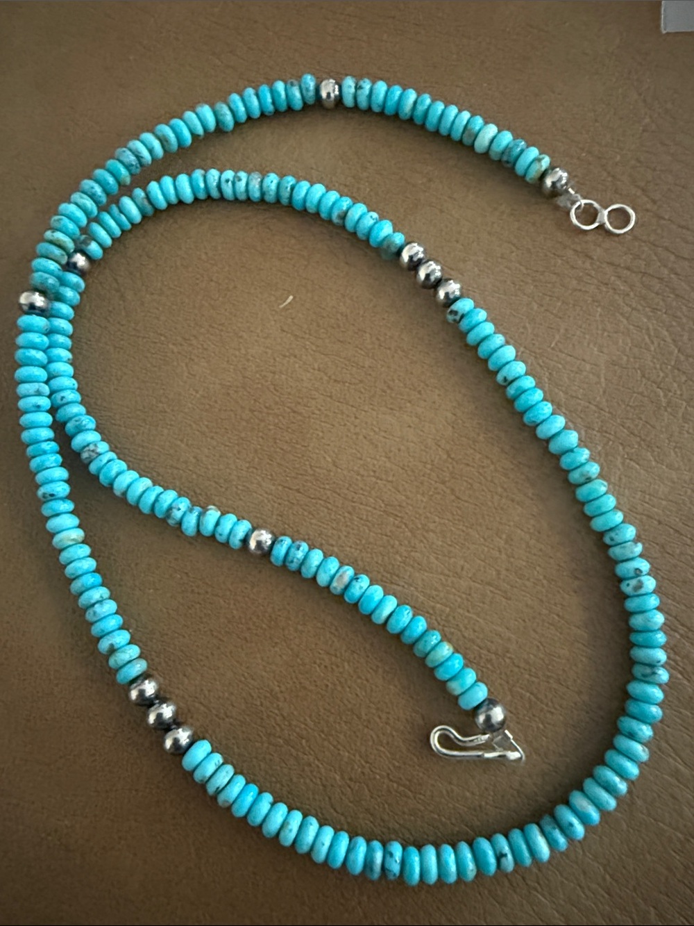 Mine 8 4mm turquoise pearls and sterling silver
18”